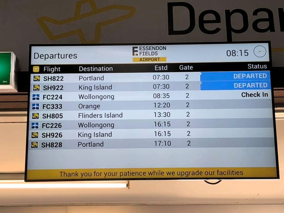 Essendon Fields departures board showing Wollongong as the destination